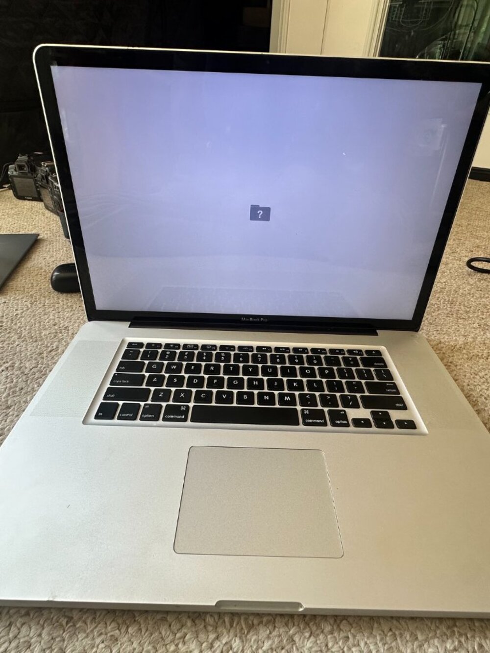 Apple Mac Book A1297-RAM 8GB-17in Screen-HDD Missing-Powers on- Charger Included